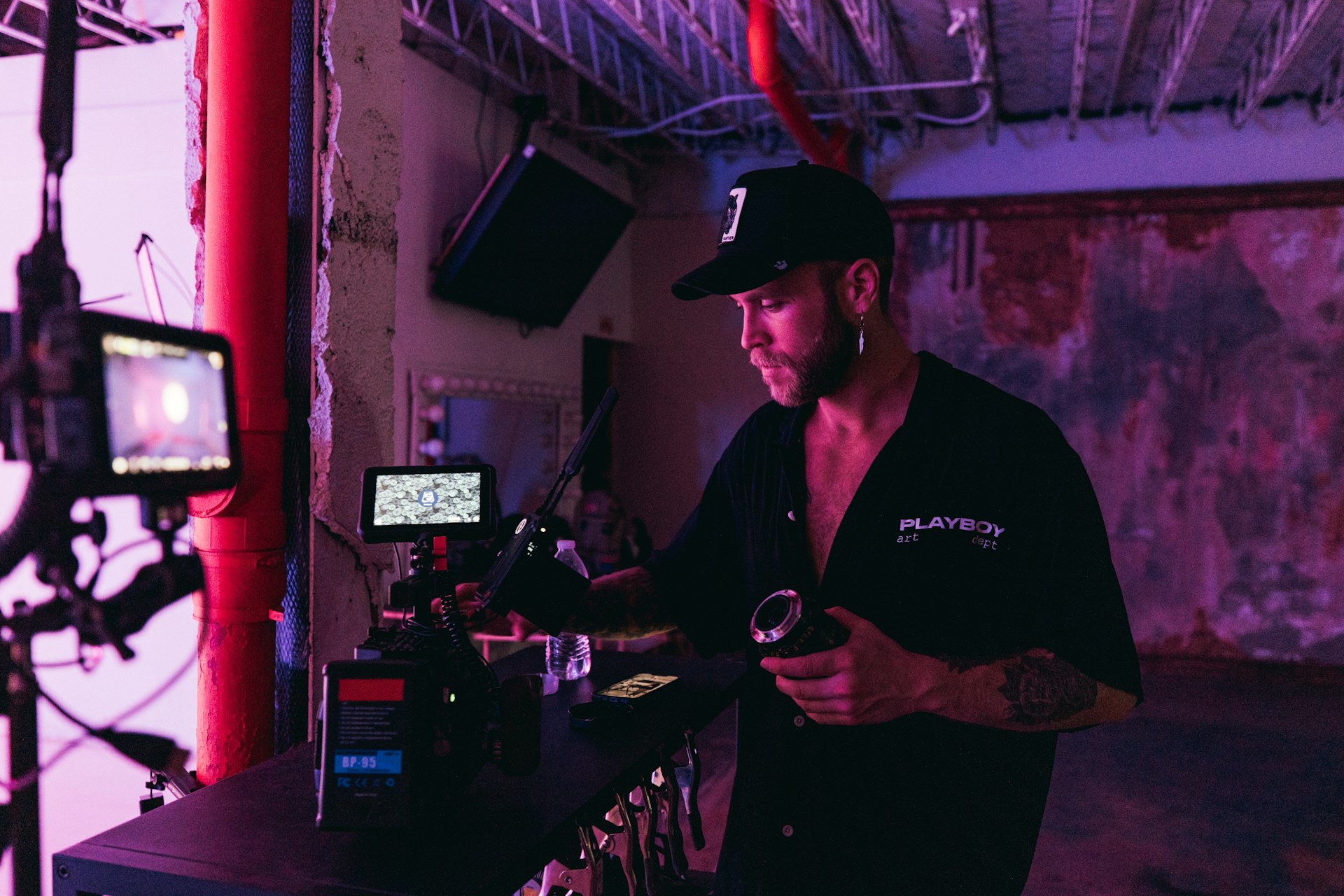 a man holding a bottle of wine